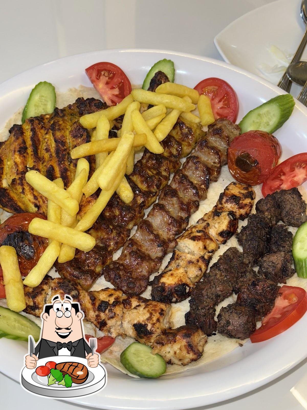 Grilled meat platter at Kabab Al Khaleej Restaurant